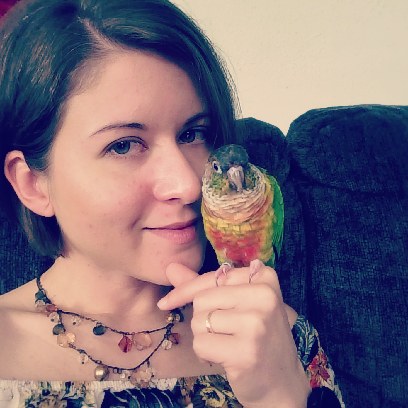 Nichole with her parrot